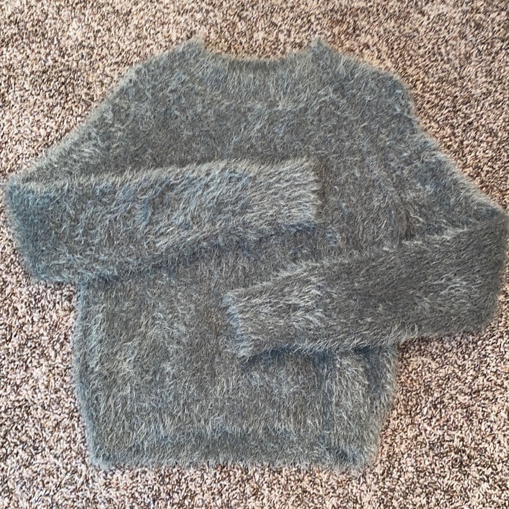 fluffy green sweater